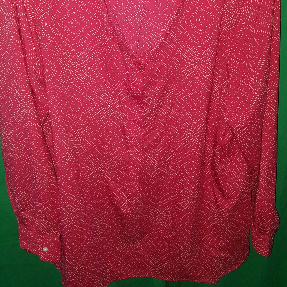 Pink and white patterned blouse